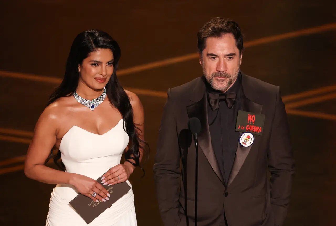 Priyanka's Oscars presentation and reaction to Free Palestine chant by co-presenter
Priyanka Chopra and Javier Bardem appeared together on stage to present the Best International Feature Film award. During his time on stage, Javier Bardem made a brief political statement by expressing support for Palestine, saying “Free Palestine.” The clip went viral with some criticising Priyanka's smirk to the chant